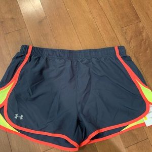 BWT Under Armour Dri Fit athletic shorts for women. Size M. Brand new with tags